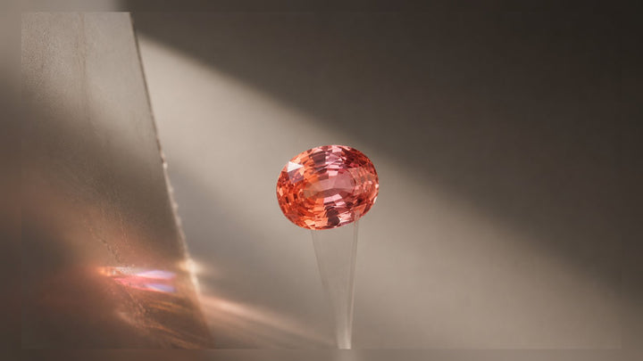 Padparadscha Sapphire raw stone editorial image for the L&H Atelier Stone Library