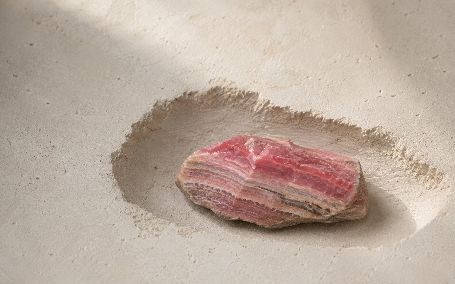Rhodochrosite stone image for the L&H Atelier Stone Library jewelry guide