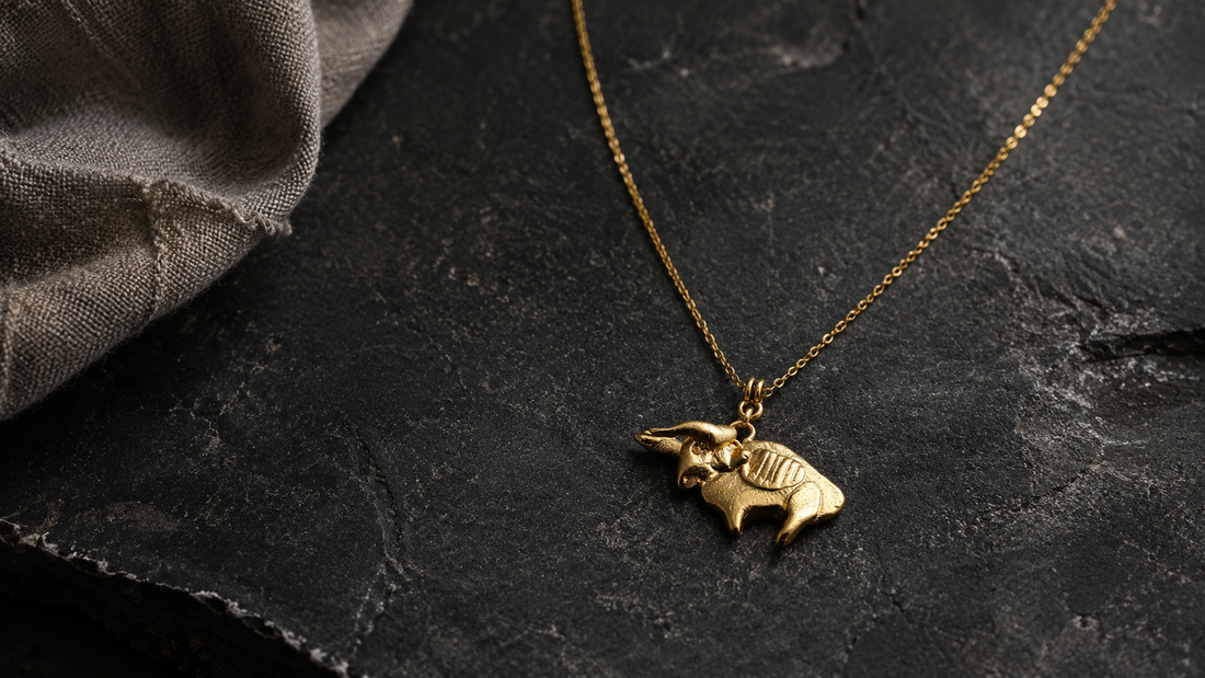 Asterion bull pendant on dark stone for L&H Atelier symbolic jewelry journal cover